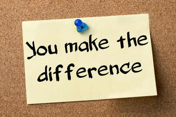 You make the difference - adhesive label pinned on bulletin boar