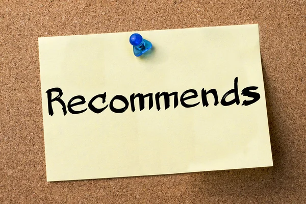 Recommends - adhesive label pinned on bulletin board