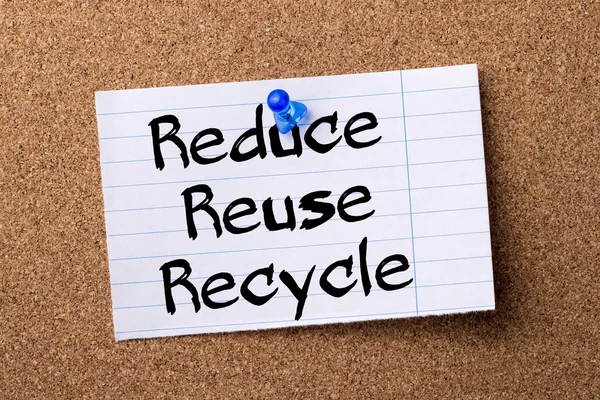 Reduce Reuse Recycle - teared note paper pinned on bulletin boar
