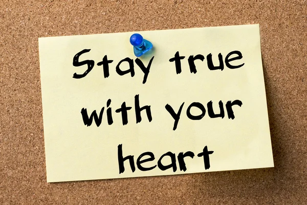 Stay true with your heart - adhesive label pinned on bulletin bo