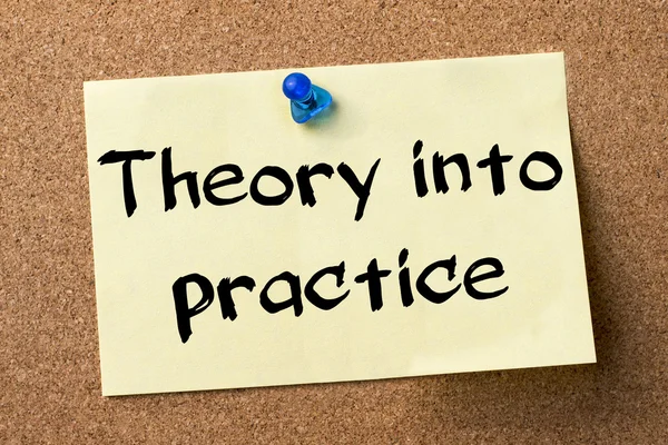 Theory into practice - adhesive label pinned on bulletin board