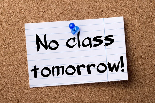No class tomorrow! - teared note paper pinned on bulletin board