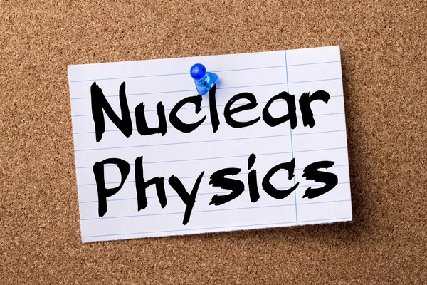 Nuclear Physics - teared note paper pinned on bulletin board