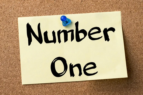 Number One - adhesive label pinned on bulletin board