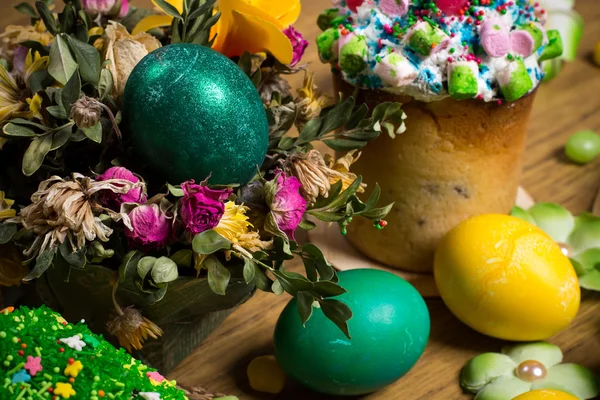 Easter celebrating family dinner, color eggs, cakes, fruit tea, sweets