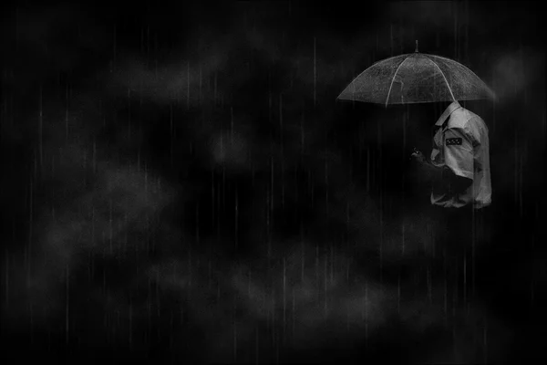 Man in the rain . Loneliness. Sadness.