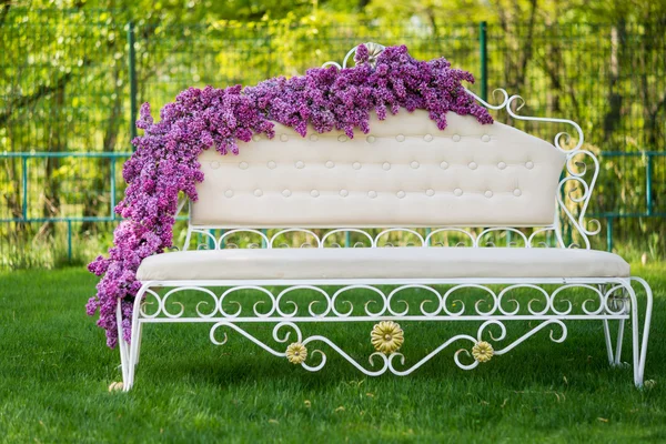Decorated sofa in the garden
