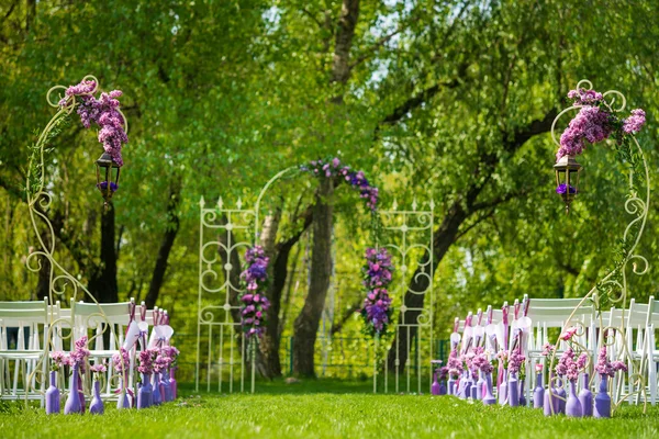 Wedding arch and chairs in the garden