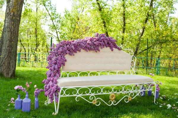 Decorated sofa in the garden