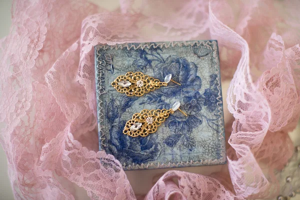 Earrings and decorative box