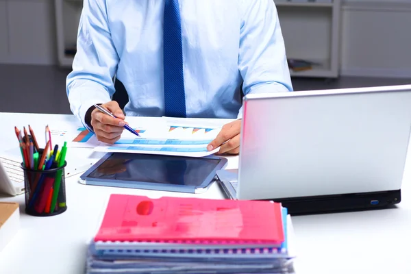 Businessman working at a desk computer graphics