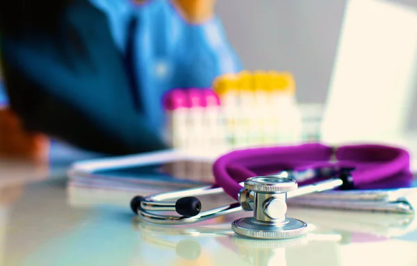 Medical preparations stethoscope doctor sitting at the table