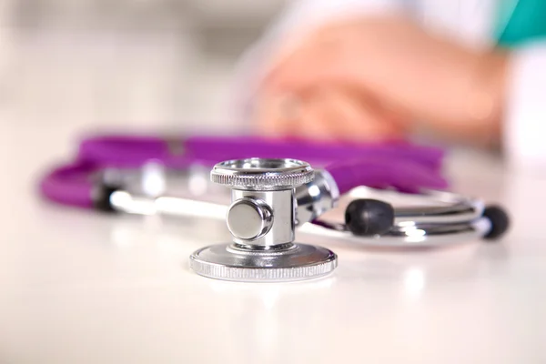 Close up medical stethoscope on a white background