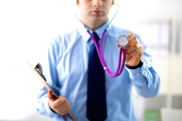 Doctor with stethoscope on the patients admission