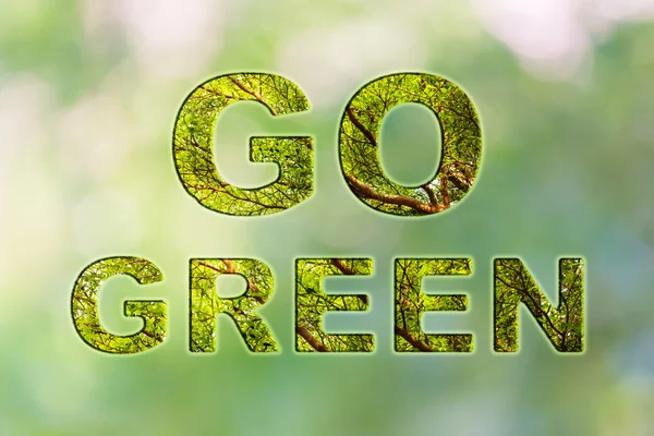 Text go green with tree bush texture inside font on natural soft