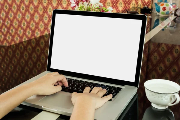 Hands with blank screen notebook computer or laptop,surfing inte