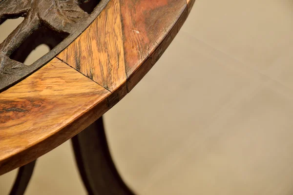 Little focus on joint of wooden table's edge