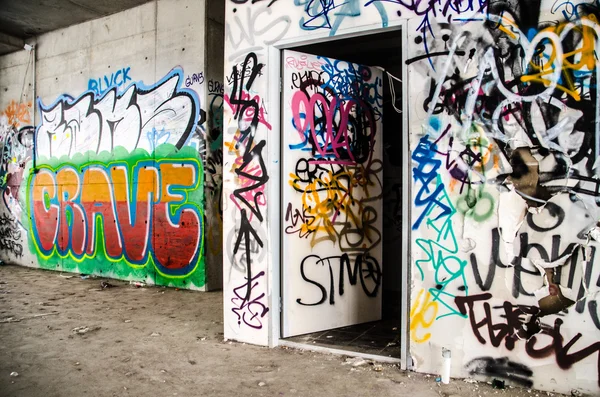 Abandon Commercial Building covered in Graffiti - Stock Photo