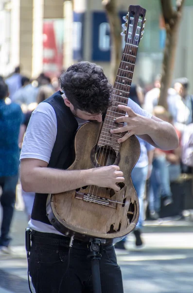 Guitarist performing in Pitt Street Mall, Sydney