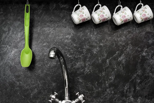 Tea cups on the kitchen wall