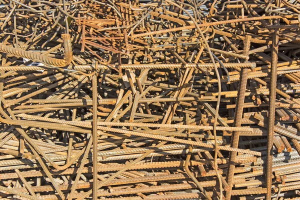 A pile of rusty iron rods