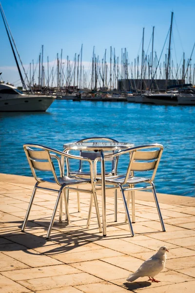 Metal furniture by the sea