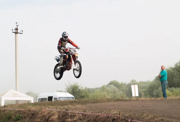 Motocross bike in a race representing concept of speed and power in extreme man sport