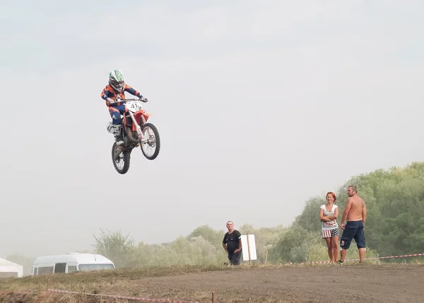 Motocross bike in a race representing concept of speed and power in extreme man sport