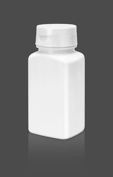 Blank packaging supplement product bottle isolated on gray background