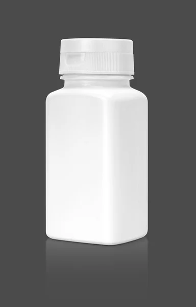 Blank packaging supplement product bottle isolated on gray background
