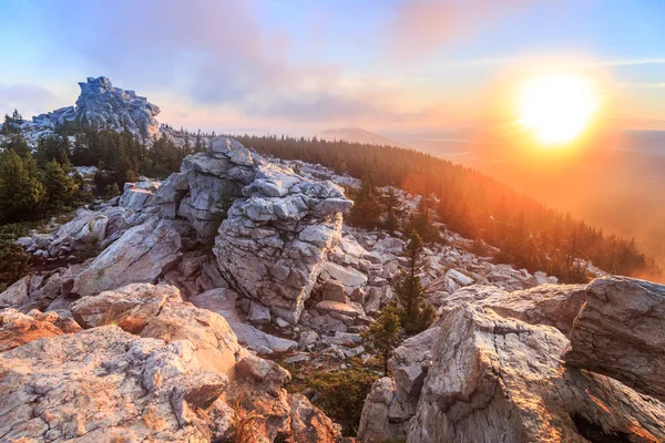 Sunrise on the top of mountain, the top of ridge, ridge in forest