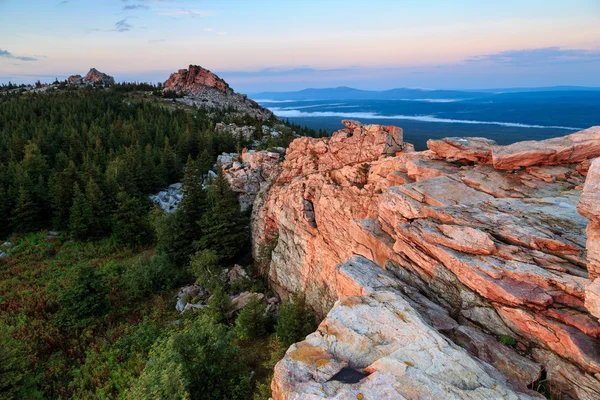 Sunrise on the top of mountain, the top of ridge, ridge in forest