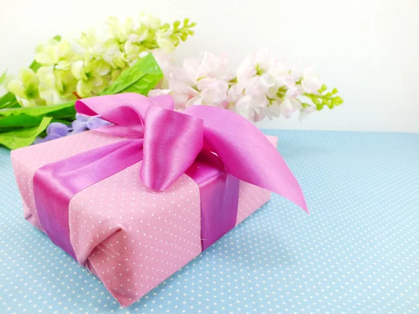 Gifts and beautiful bouquet of flowers for mother day birthday or other holiday