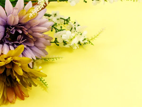 Colorful artificial flowers for background