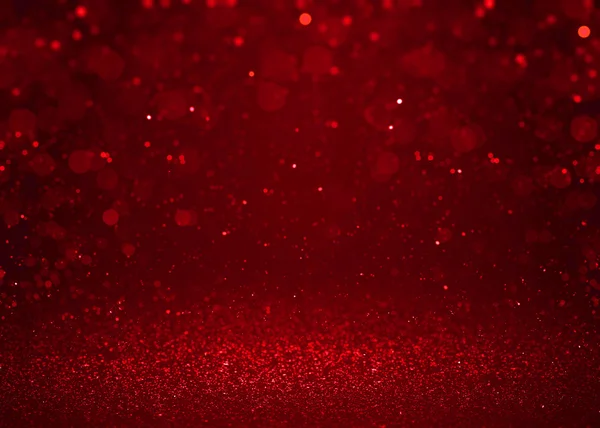 Red sparkle glitter abstract background.