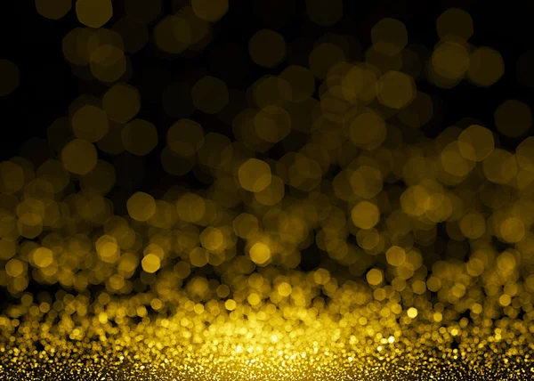 Defocused gold sparkle glitter lights background