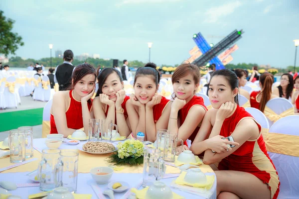 Hochiminh City, Vietnam - January 17, 2014: Unknown, the beautiful girls is a models of marketing for the company in an outdoor beer Saigon New Year party. This is the biggest beer companies in Vietnam