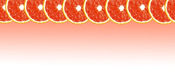 Grapefruit halves background with space for text on a white back
