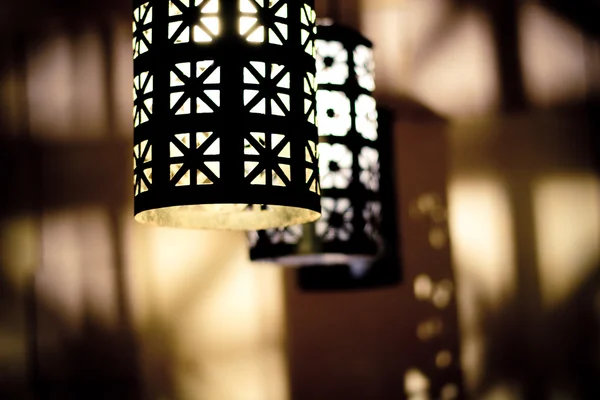 Wrought iron lamp in a cozy atmosphere