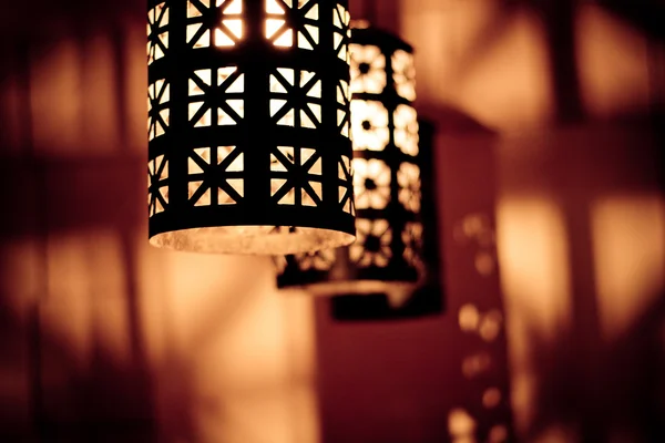 Wrought iron lamp in a cozy atmosphere