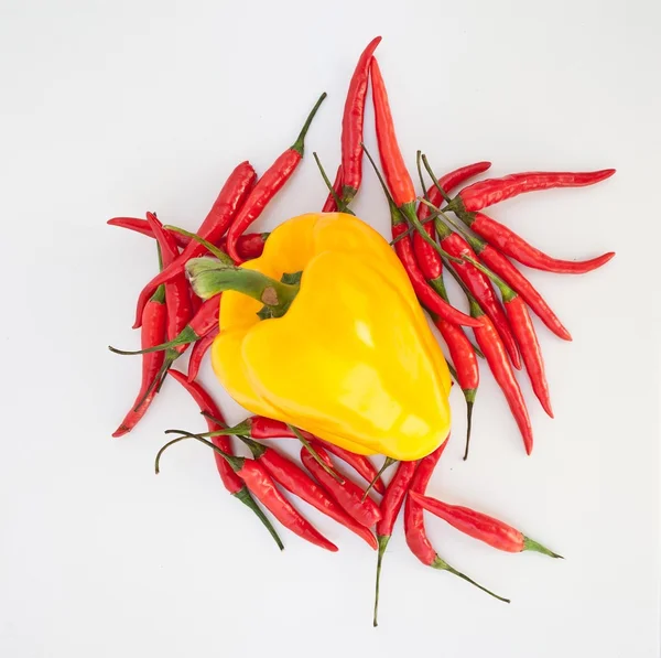 Yellow pepper and red chili peppers