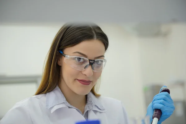 Students take samples in the laboratory