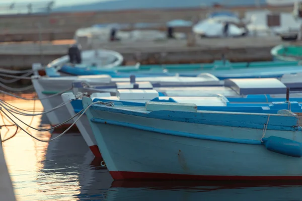 Old boats anchored in the harbor