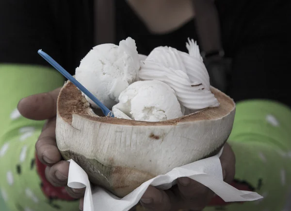 Coconut icecream from street food vendor