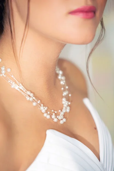 Necklace on the woman\'s neck