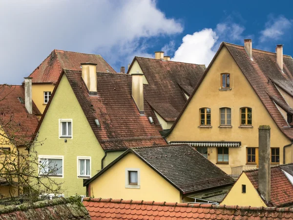 Urban landscape with an ancient houses and a tiled roofs. Rothenburg, Bavaria, Germany.