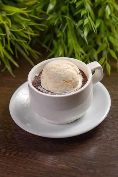 Cup of hot chocolate with an ice cream ball