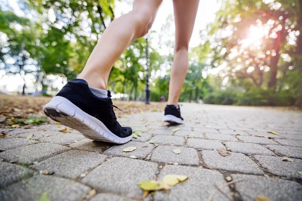 Female feet while jogging