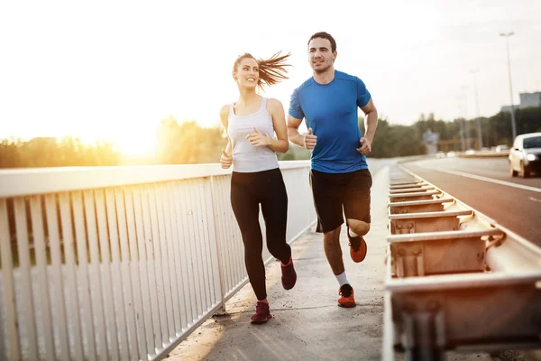 Active couple jogging