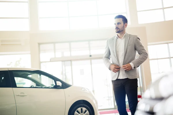 Custormer walks into car dealership